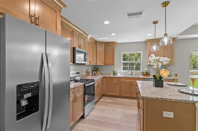 12483 DOWNY WOODPECKER ROAD photo 19